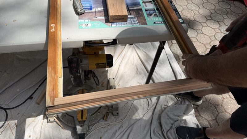 Glazing bead being fitted to a repaired window sash