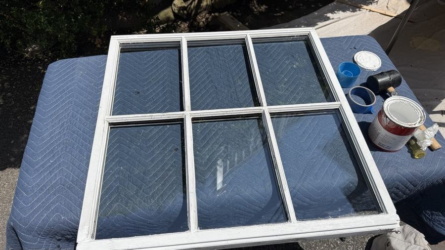 Same wood window sash after glass replacement and full restoration by WindowServ