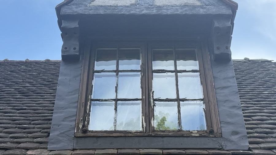 Slate roof dormer window with replacement glass