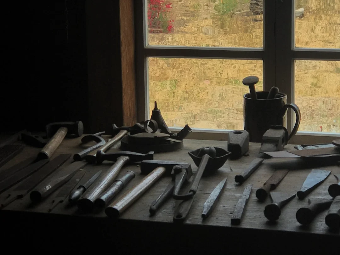 Essential tools laid out for window balance repair