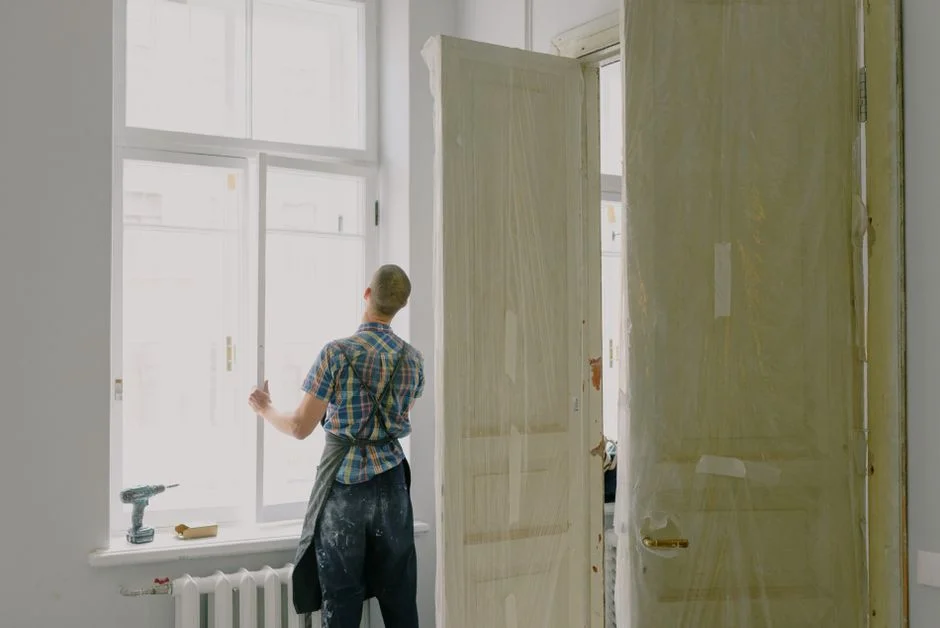 Professional technician measuring a window sash for glass replacement in a modern home - how to repair a foggy window