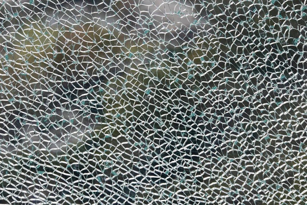 mineral deposits on failed window glass interior close up